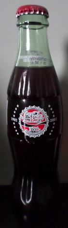 2001-2386 € 5,00 coca cola flesje 8oz 100th anniversary Mid. America C.C. bottling compagny 1902-2002.jpeg